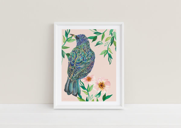 White framed art print of a watercolor Starling bird with leaves and flowers
